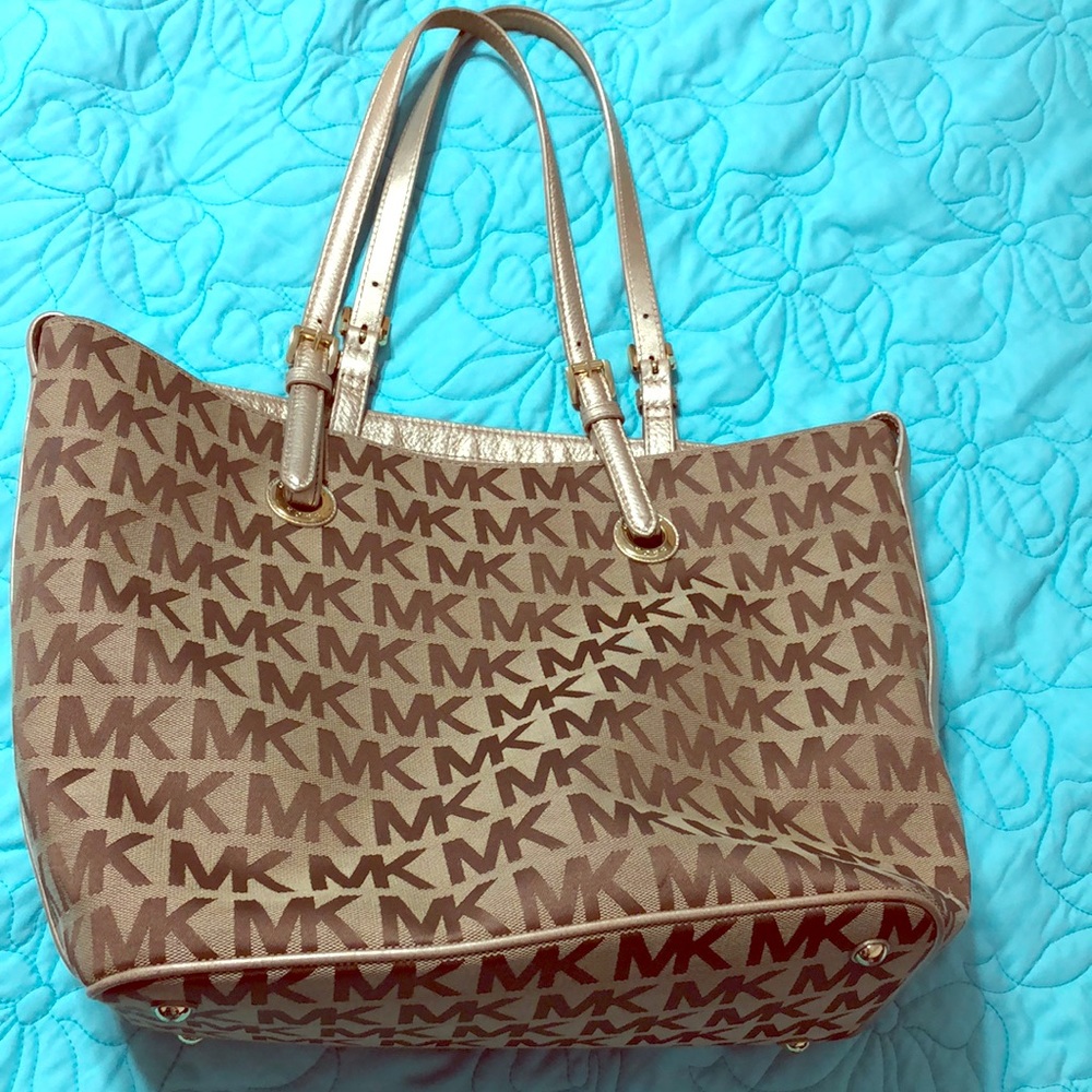 Michael Kors gold and tan color, look as new